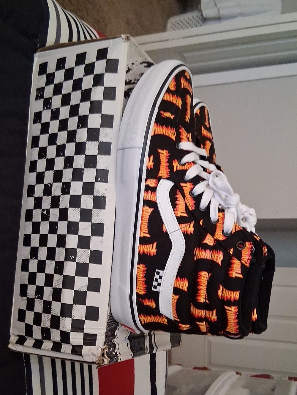 Vans High-Top Sneakers in Black and Orange Flame Print